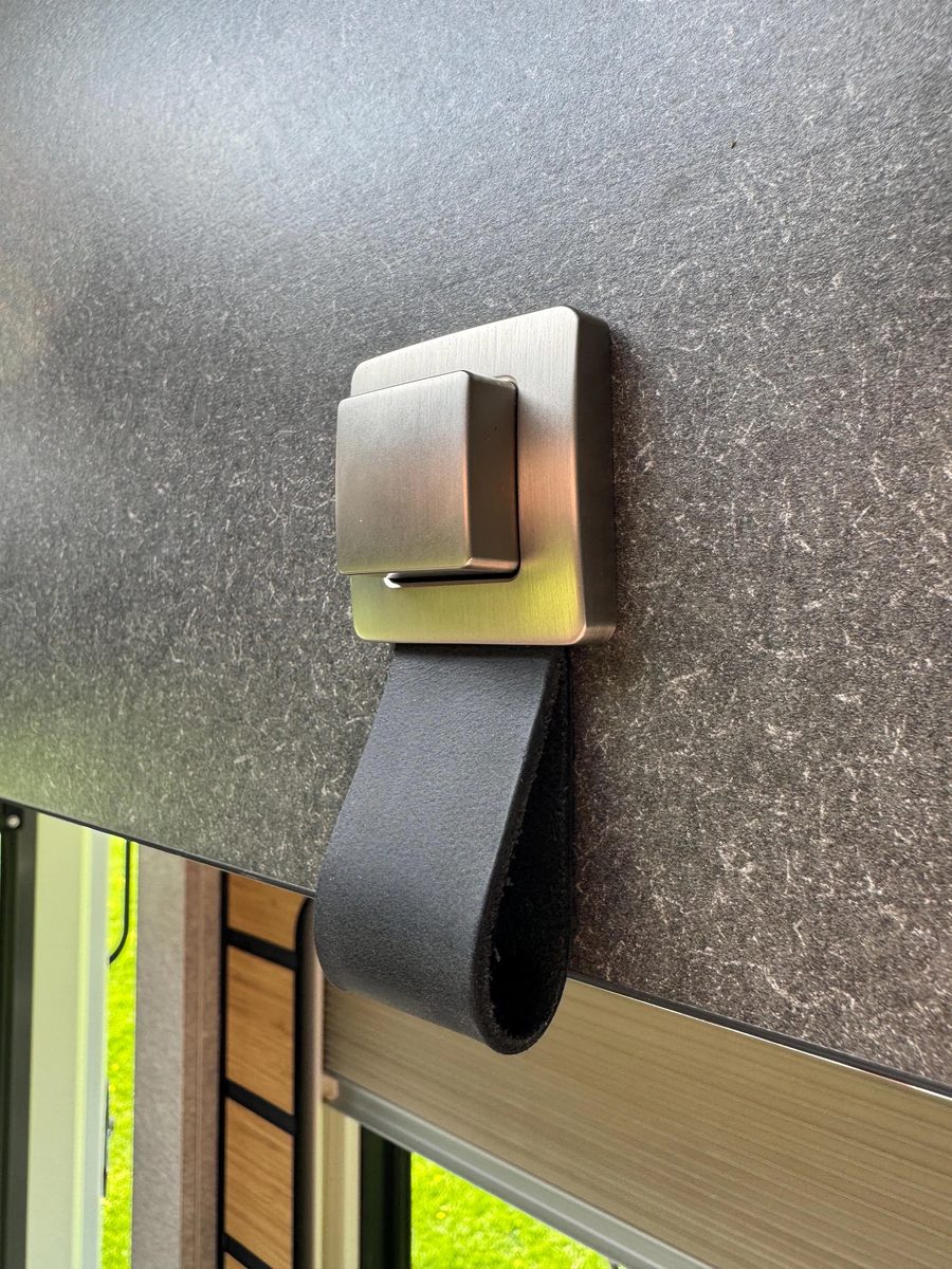 Black leather cabinet door strap on Hymer locker